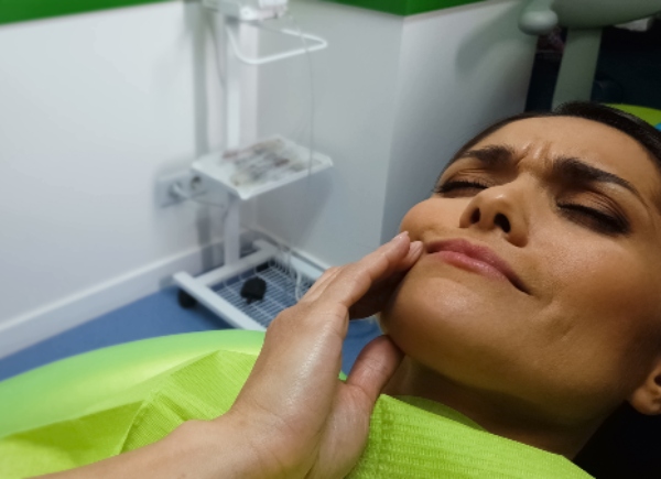 Female waiting for nitrous oxide sedation before treatment in Portage